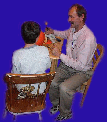 Daddy and Scottie carve the pumpkin